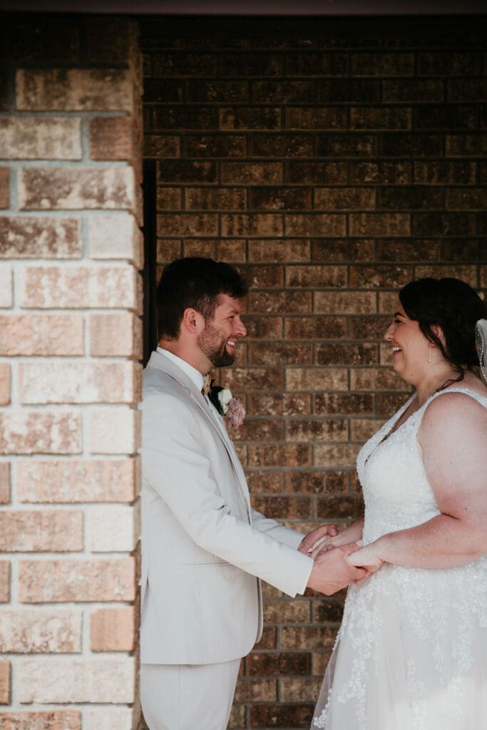 Groom reacting to bride during private first look at Billings wedding venue