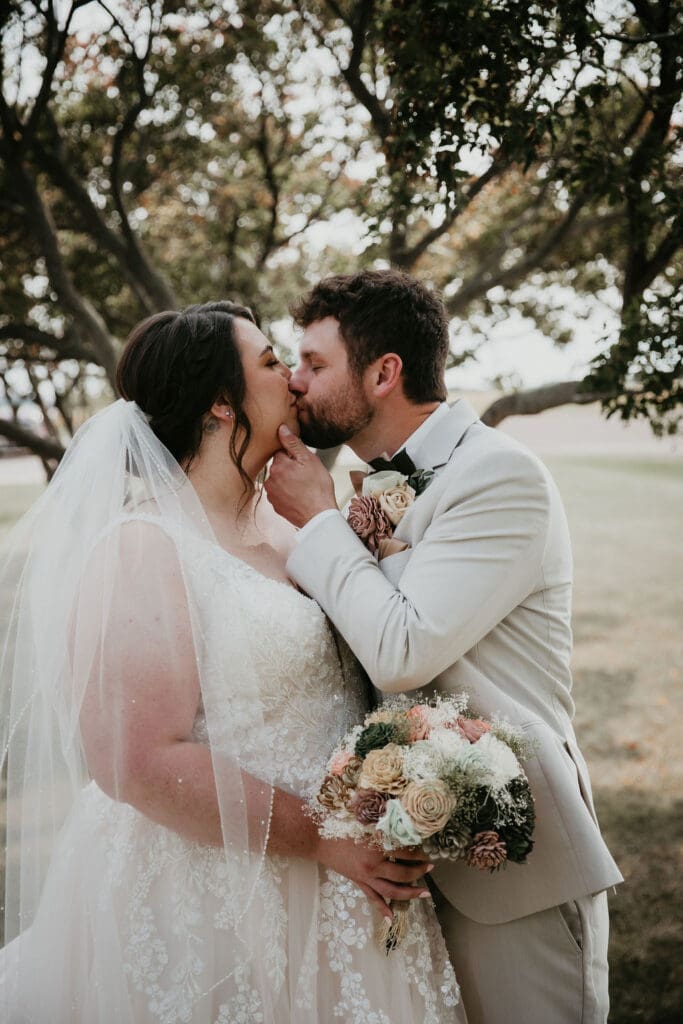 Bride holding wooden floral bouquet before wedding in Billings