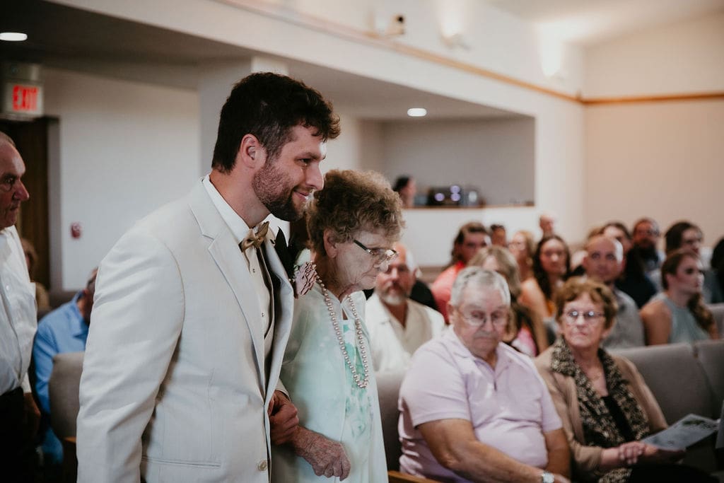 Flower girl walking down aisle at Billings church