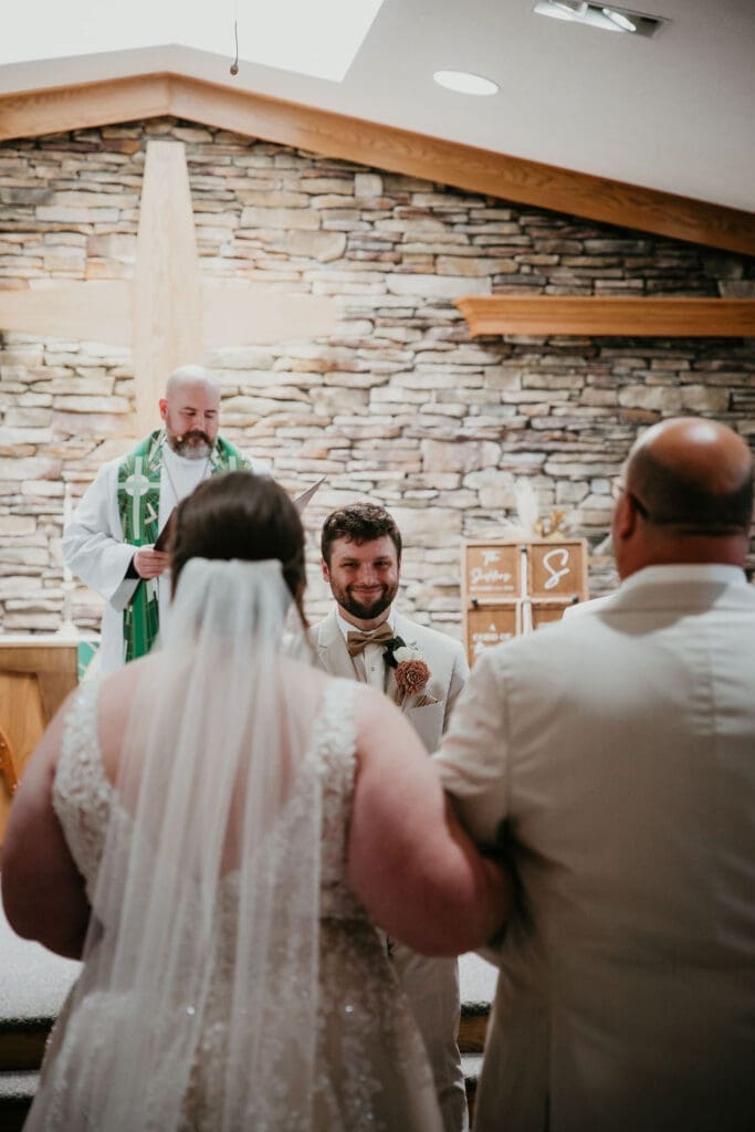 Church ceremony with stained glass windows in Billings, Montana
