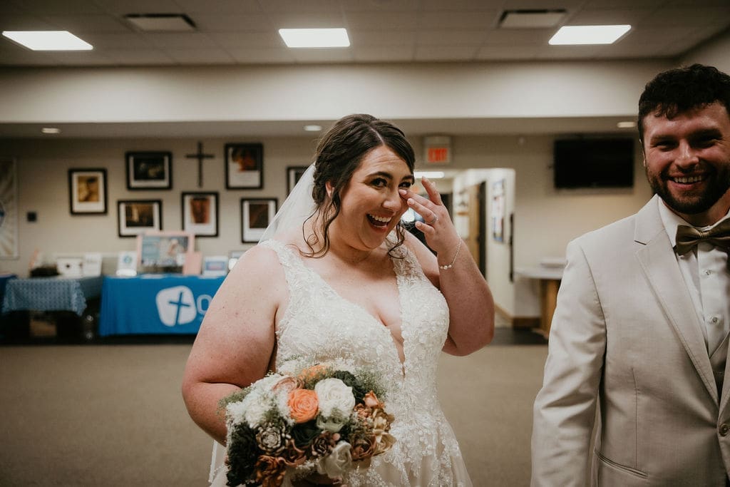 Wedding kiss captured inside small church in Billings