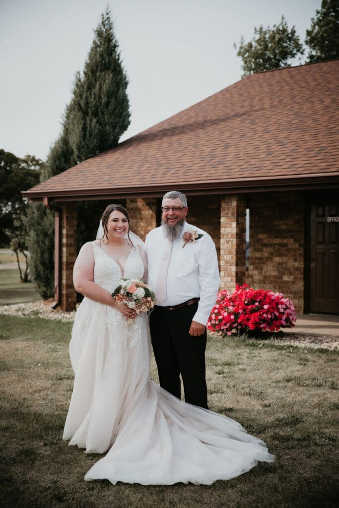 Soft bridal portrait under trees outside Billings wedding venue