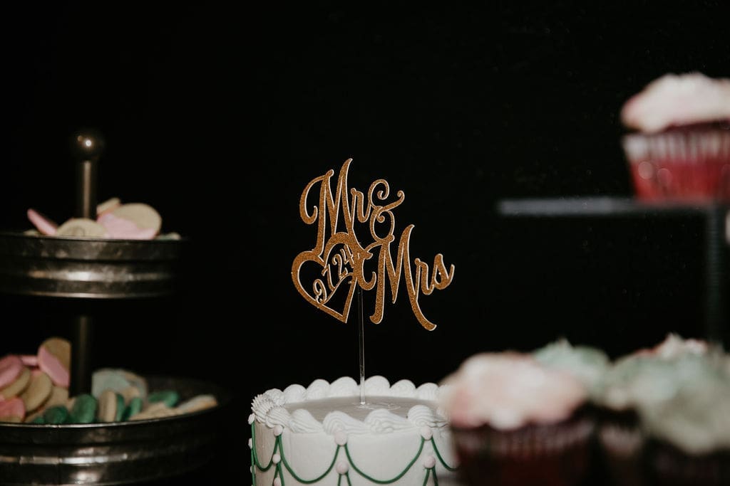 Soft green and pink cake details from Billings reception
