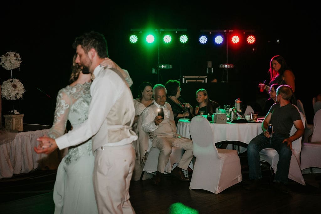 Candid moment of grandparents watching first dance in Billings