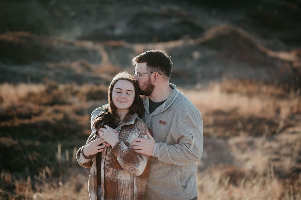 Miles City Montana engagement session with cozy fall tones and natural laughter.