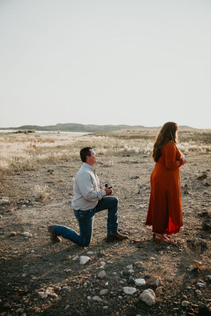 Emotional reaction during surprise proposal photographed by Glasgow engagement photographer